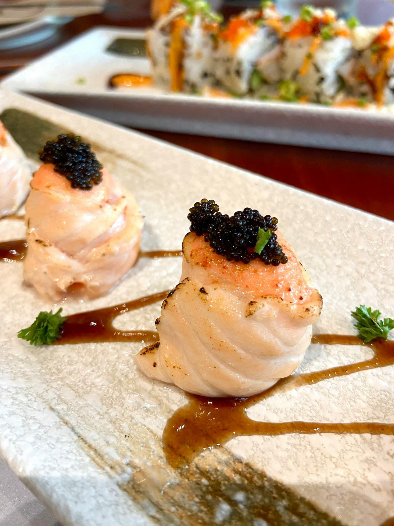 closeup of fish appetizer with caviar