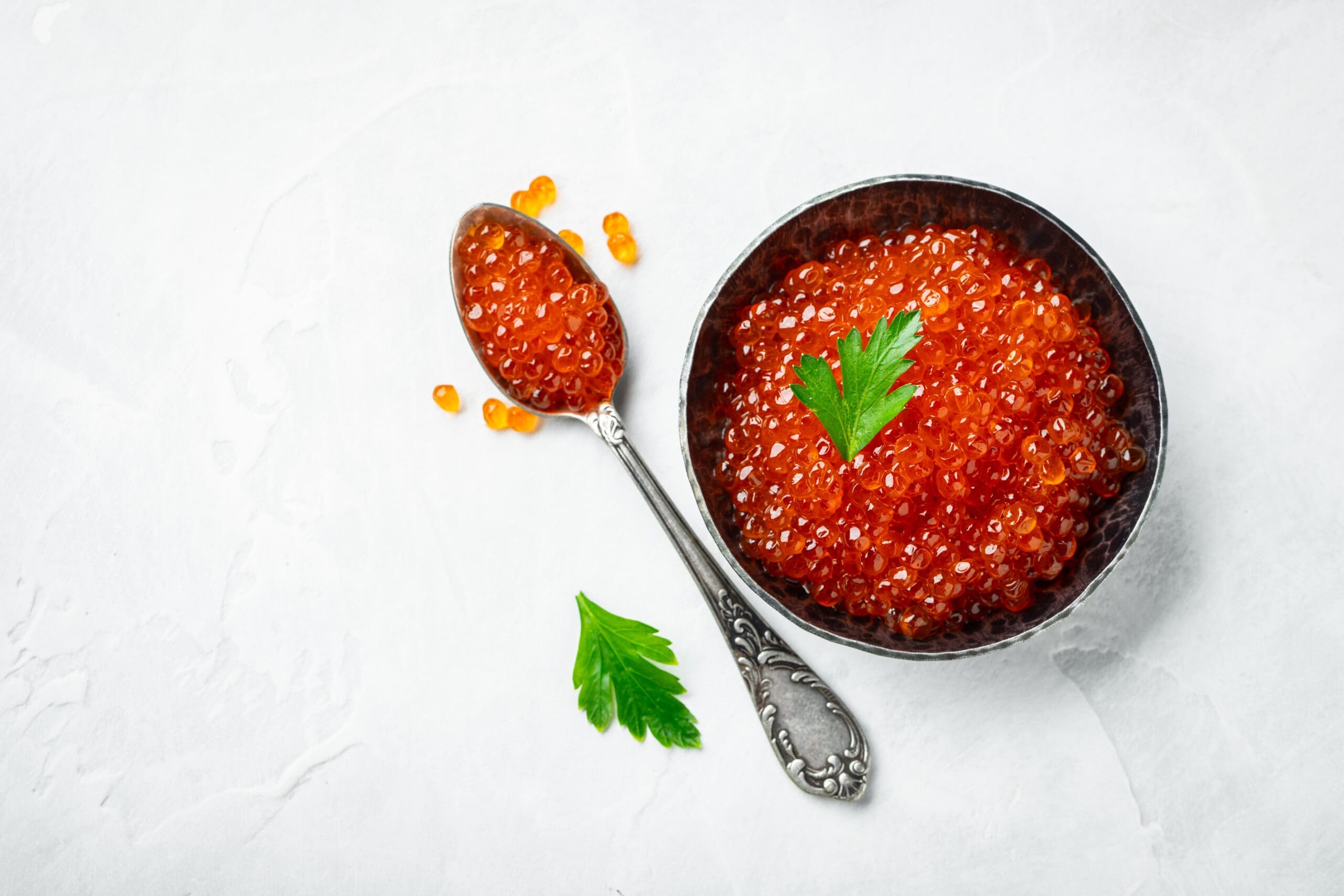 Chum Salmon caviar in stainless steel bowl