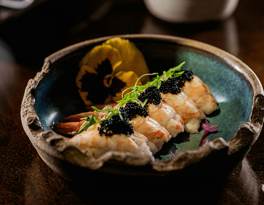 American caviar on top of ebi Japanese nigiri