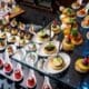 A buffet table with caviar appetizers