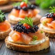 Canapes topped with salmon and caviar