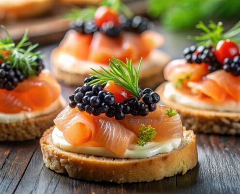 Canapes topped with salmon and caviar