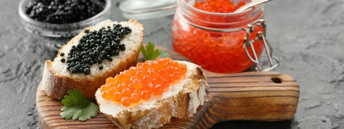 An assortment of caviar and roe served with bread