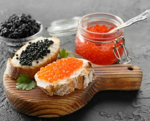 An assortment of caviar and roe served with bread